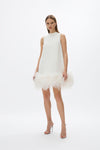 Linc Mini: chic white A-line mini dress featuring a voluminous feather hem for a playful touch, perfect for wedding events. 