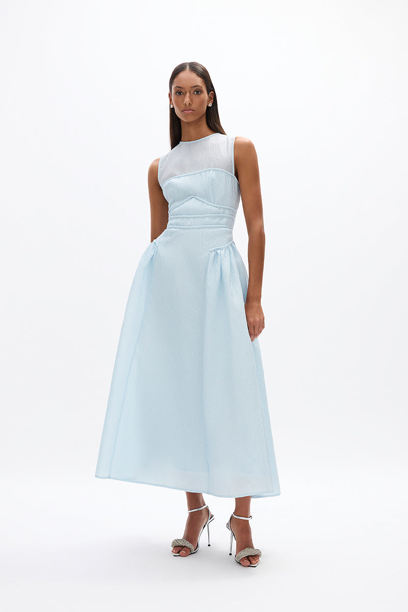 Sophia Dress: sophisticated blue cocktail dress featuring fitted waist and voluminous skirt, perfect for day to night soirees. 