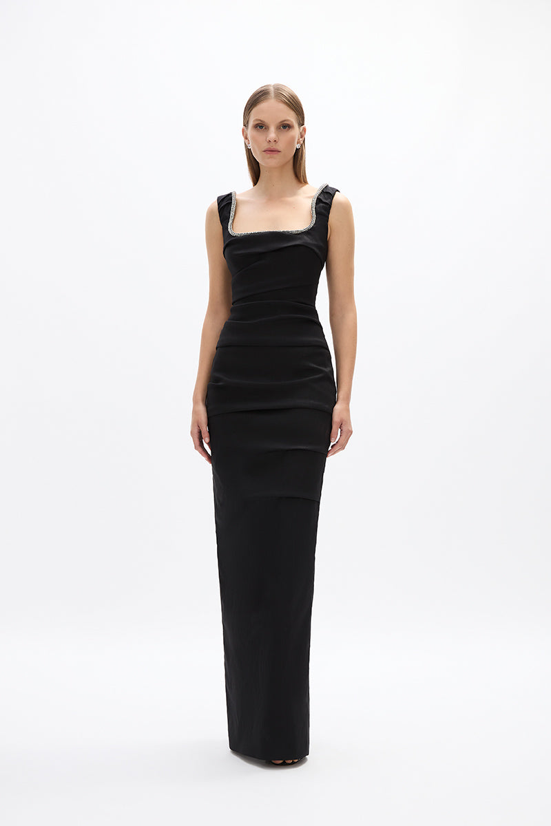 Onyx Gown: elegant black full-length gown with fitted bodice and hand-embellished detail, perfect for formal events. 