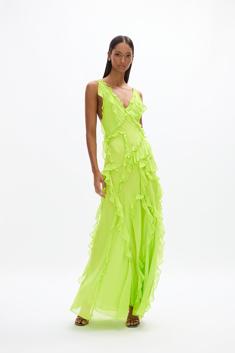 Cedar Gown: elegant full-length lime green maxi dress with semi-sheer fabric, thin straps, and frill detail throughout.