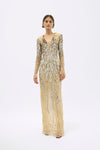 Full length front image of model wearing Rachel Gilbert Blanca Gown in gold